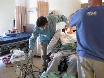 A patient receives free care from the Virginia Mission of Mercy program in Westpoint, Virginia, with supplies donated by Henry Schein Cares, the global social responsibility program of Henry Schein.